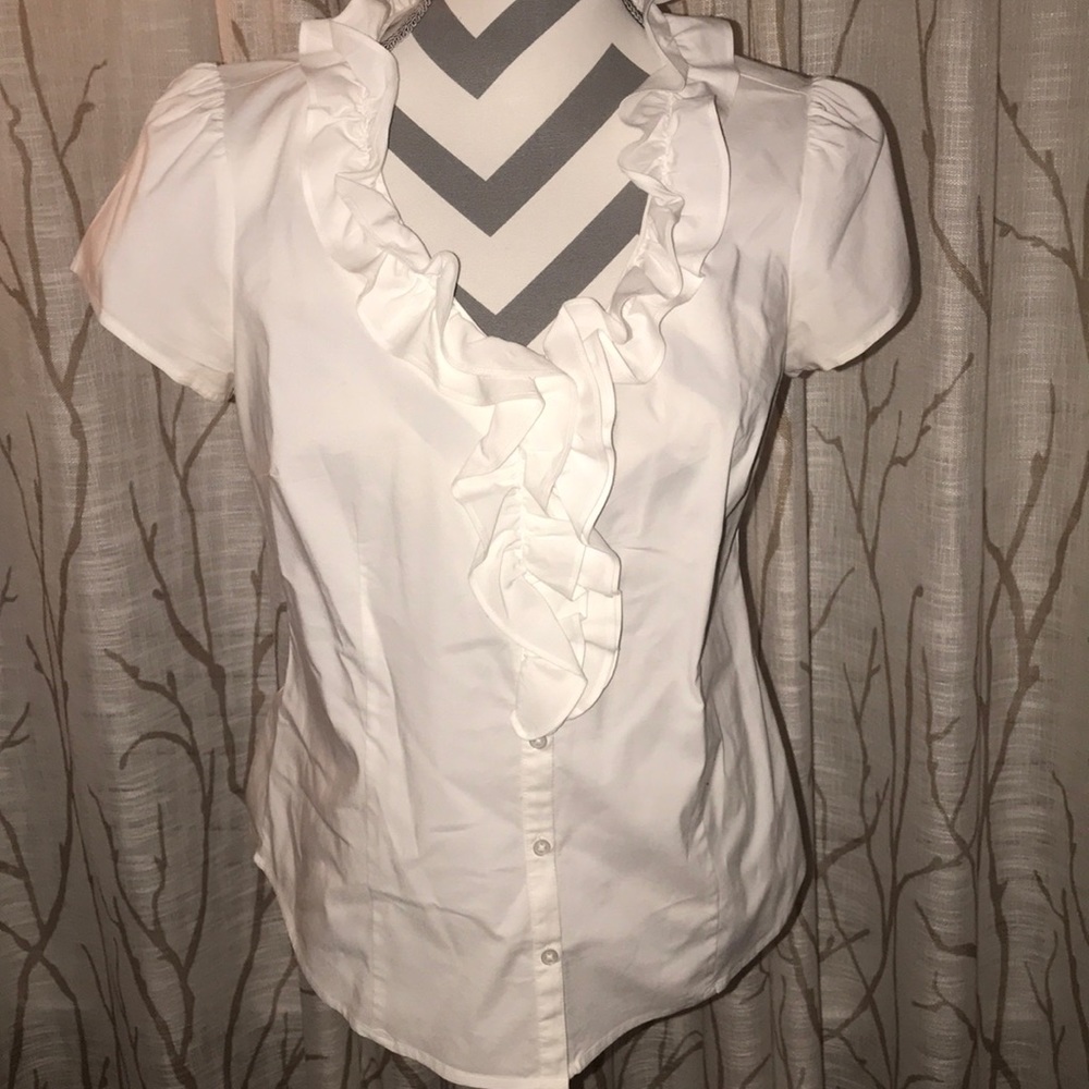 White ruffle blouse